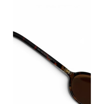 Miu Miu Oval Tortoiseshell Sunglasses