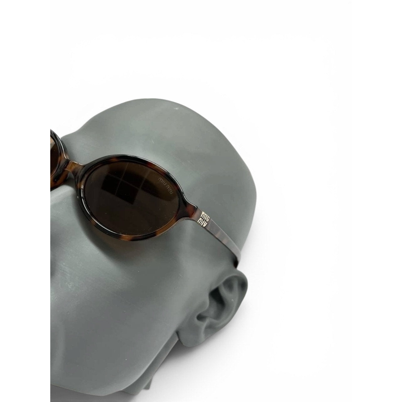 Miu Miu Oval Tortoiseshell Sunglasses