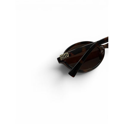 Miu Miu Oval Tortoiseshell Sunglasses