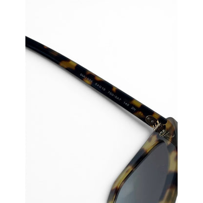 Miu Miu Tortoiseshell Cat Eye Sunglasses